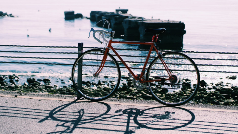 a bike parked by the road